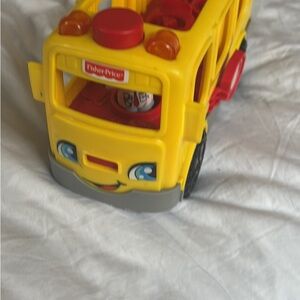 Fisher-Price Smiling Yellow Bus with Red Accents